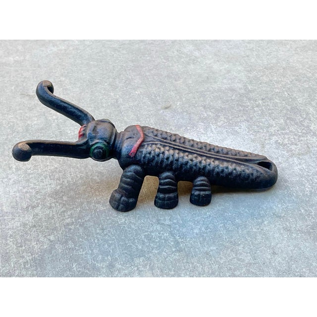 Vintage Cast-Iron Beetle boot jack, door stop. Can also be hung and used as a decorative piece, as well as a fully...