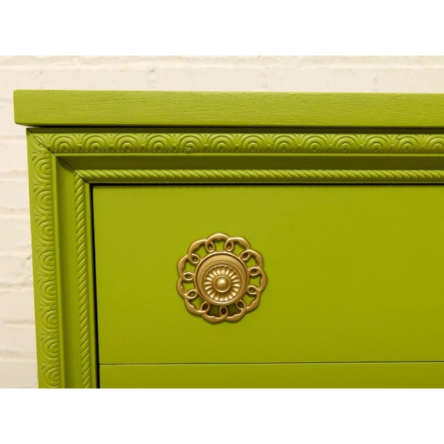 A fabulous vintage highboy dresser completely transformed in a bold chartreuse finish. The tall five-drawer silhouette is...