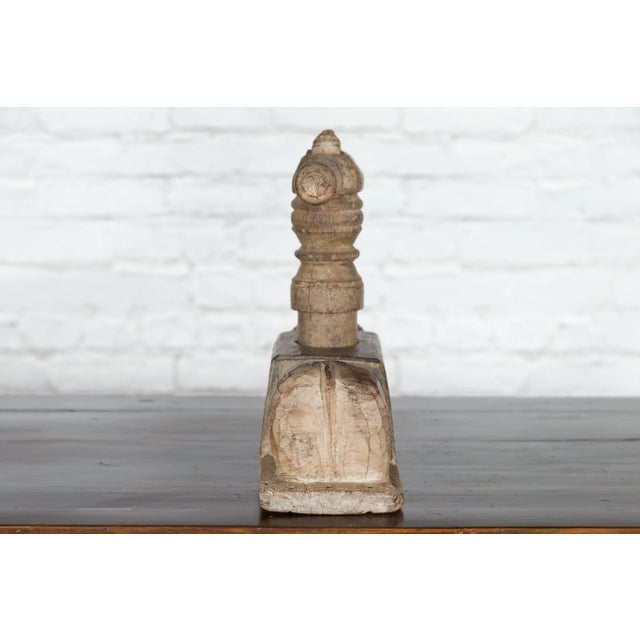 An Indian antique carved wooden hand noodle press from the 19th century, with ram motif. Created in India during the 19th...