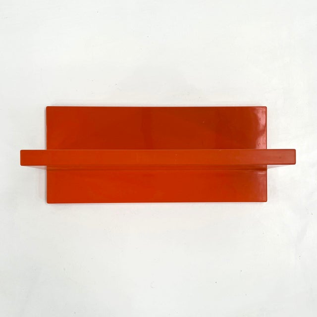 Orange Wall Shelf by Marcello Siard for Kartell, 1970s, in Good conditions. Designed 1970 to 1979 I have official proof of...