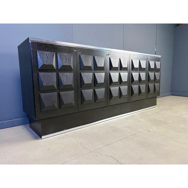 Ebonized black brutalist credenza with 5 doors which offer plenty of storage space Beautiful timeless design Very good...