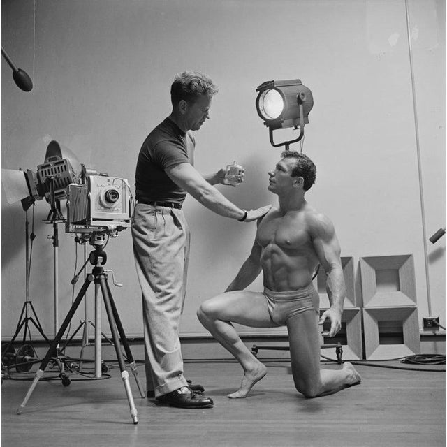 Muscle Man A shirtless bodybuilder kneels for a studio photoshoot, circa 1955. (Photo by Graphic House/Archive...