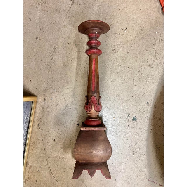 Large vintage candlestick holder beautiful carved wood and painted with red accents. Pricket top for candle.