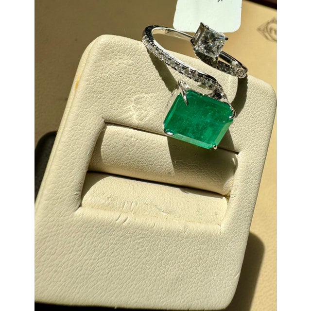 3.11 Ct Finest Emerald in Emerald cut Shape & 0.49 Ct Diamond Ring in 18 Kt Gold Size 6.25 Its a brand new Piece A...