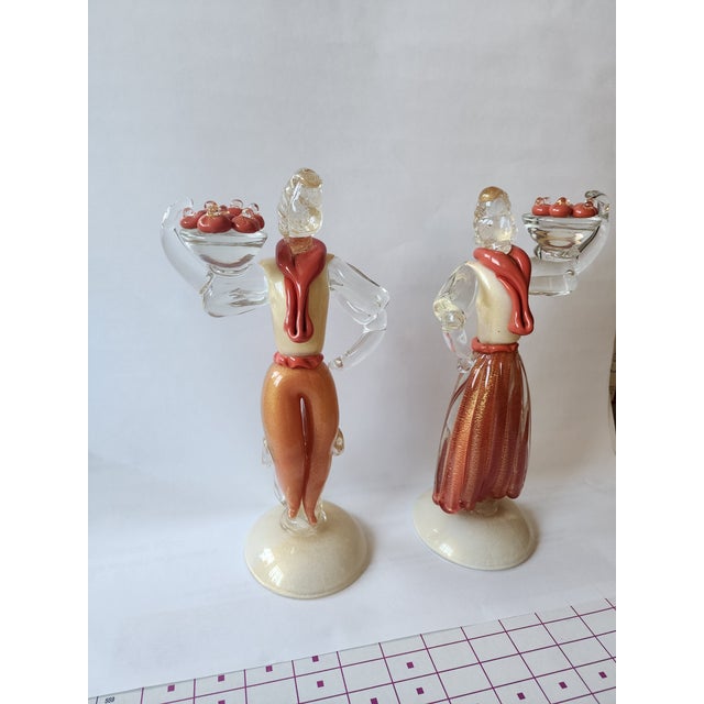 Stunning pair of circa 1950 Murano glass figures...beautiful partial gold fleck sections and clear arms bowls and...