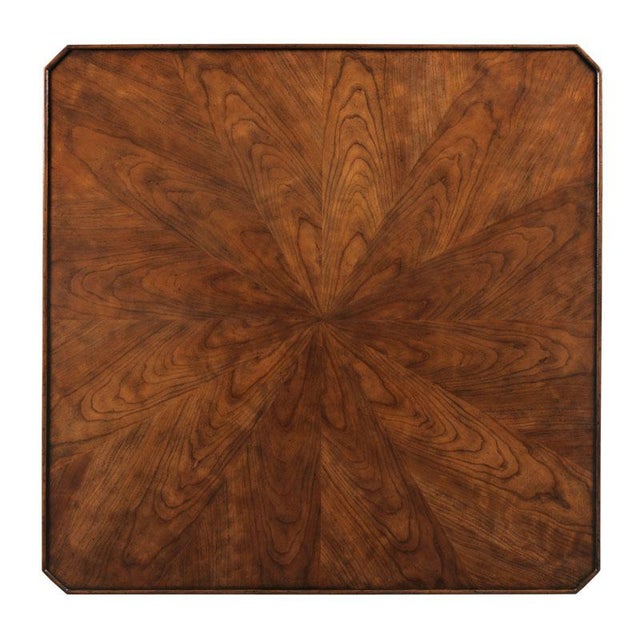 A galleried rectangular top is elevated by canted squared tapering corner posts joined by shaped apron rails.