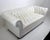 Chic and stylish tufted white vinyl Chesterfield loveseat sofa on wood bun feet. Overall excellent condition, showing only...