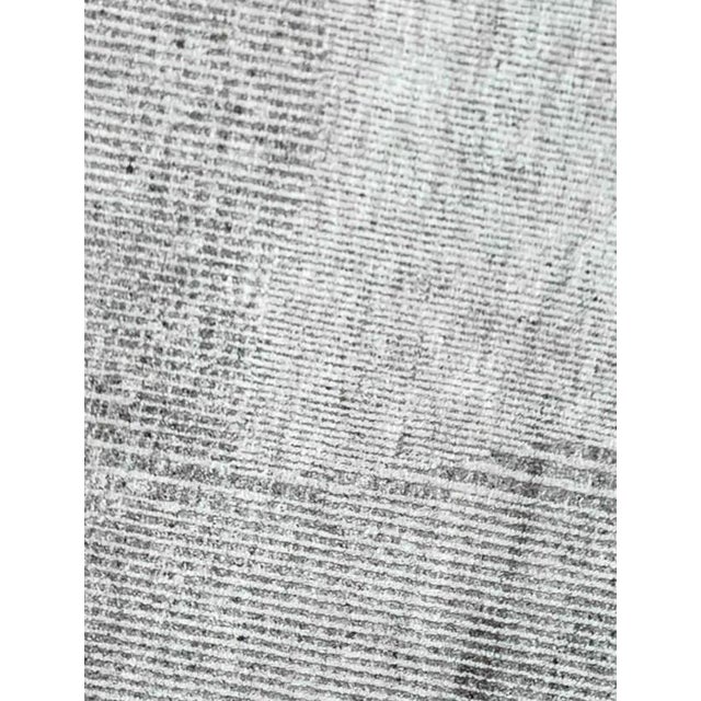 Beautiful hand knotted modern and fashionable collection of borderless designs rug, made of 75% wool and 25% cotton in...
