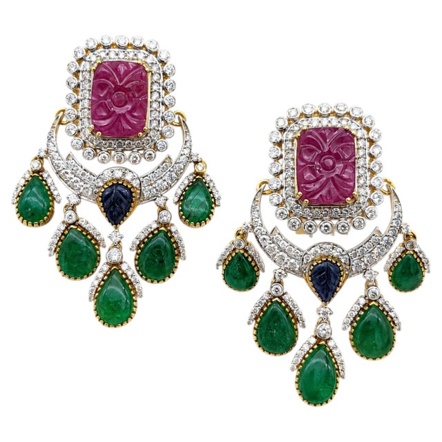 Gemstone details Diamond weight: 3.12 cts Ruby weight: 4.44 cts Sapphire weight: 2.87 cts 14K gold Gross weight: 17.79...
