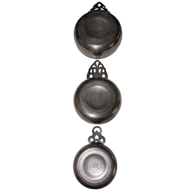 These three pewter porringers make for a sophisticated set, capturing the timeless appeal of early American metalware....