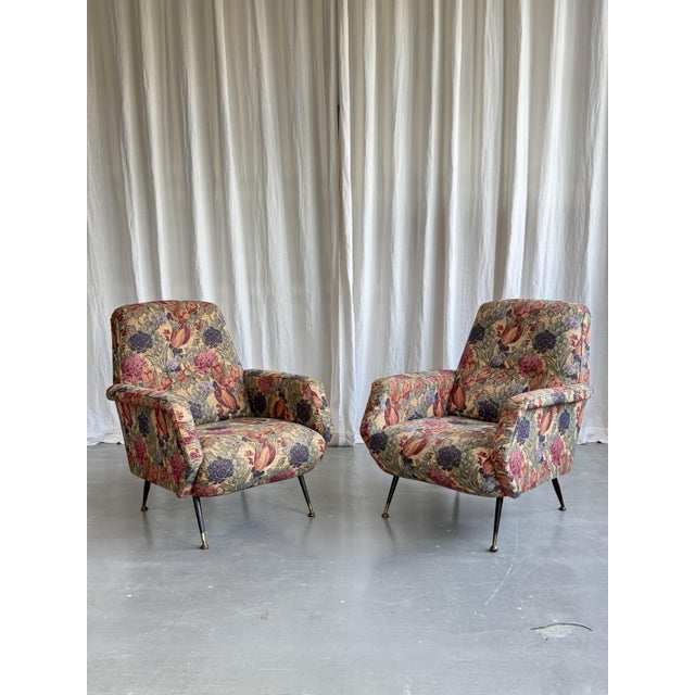 Charming pair of mid century armchairs with floral pattern upholstery from Italy, 1970s. Reminiscent of the style of Marco...