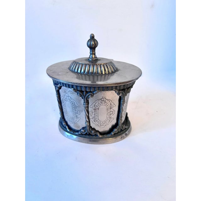 A wonderful Tea Caddy designed to be removed from the ornate framework. A great piece for tea, tobacco, 420 or useful as...