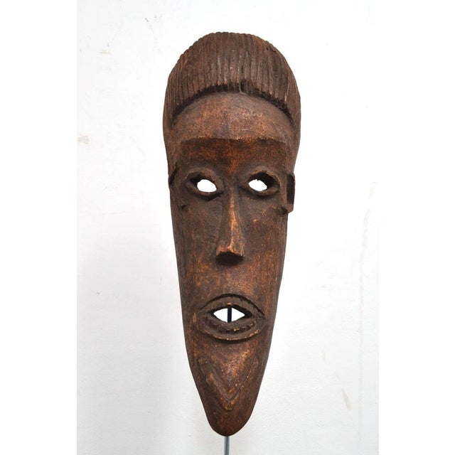 This mask came to the Netherlands from West Africa in the 1940s. It has been used for years during rituals and ceremonies...
