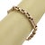 This antique 9k rose gold engraved link bracelet is a timeless piece of fine jewelry that exudes elegance and...