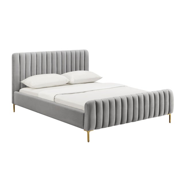 We can't guarantee your dreams will come true, but at least we can help you dream in style. The Angela bed features glam...