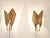 A pair of leaf-shaped brass wall lamps by italian designer tommaso barbi, produced by g&g studio e design, dating back to...