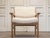 Refined and highly tactile armchair designed by Hans J. Wegner, produced by Getama, Denmark in the 1980s. Crafted from...