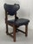 Wonderful set of 4 brutalist dining chairs with dark blue upholstery. The wood is in a lovely used vintage condition and...