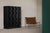 A rare and masterfully crafted example of 1970s Belgian brutalist design, this graphic-paneled bar cabinet by Maison...
