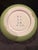 This elegant porcelain vase features a smooth, rounded globe shape with a soft ivory-colored glaze. Ite minimalist...