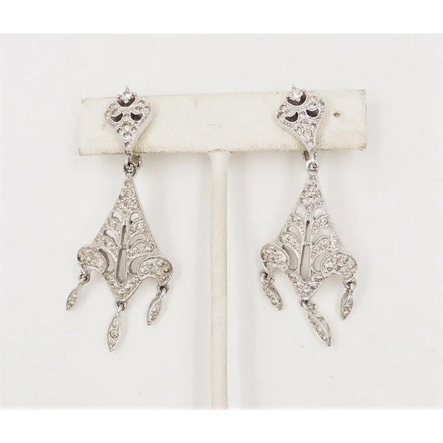 Metal Vintage 1960s Signed Polcini Rhodium Plated Rhinestone Chandelier Clip Earrings - 2 Pieces For Sale - Image 7 of 8