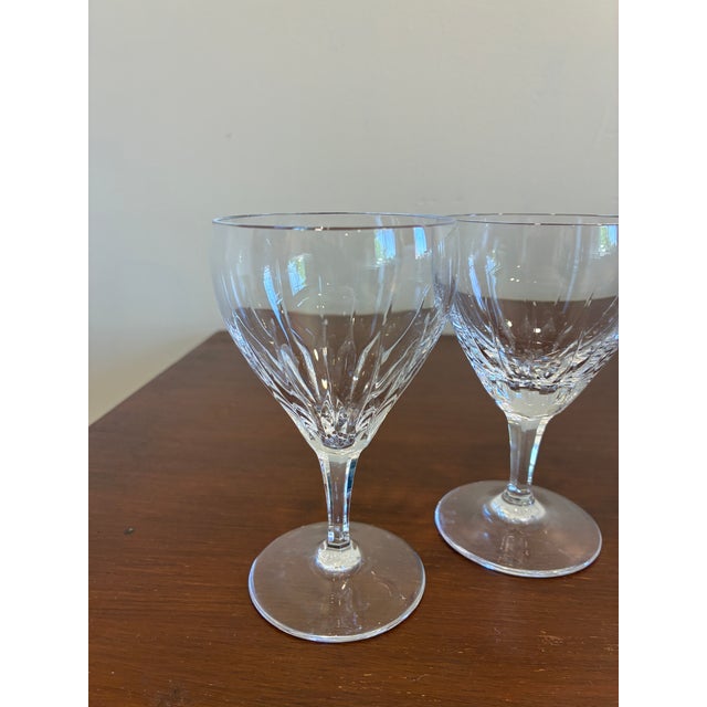 Set of 4 vintage Josair crystal wine glasses featuring an elegant cut crystal motif and classic stemmed silhouette. These...