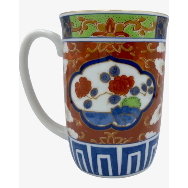 Details: -This beautiful mug has an asian/oriental motif -Bottom stamped with Japanese characters -Approx. Dimensions: 4"H...