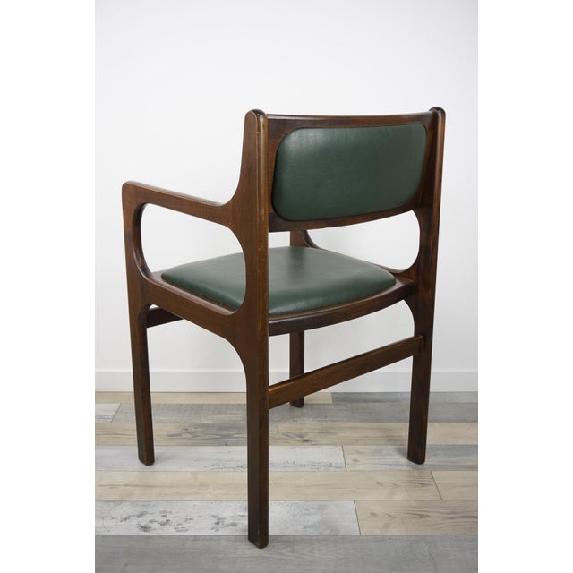 A stylish and comfortable 1960s Scandinavian-inspired designer armchair. Beautifully crafted with lovely woodwork, the...
