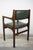 A stylish and comfortable 1960s Scandinavian-inspired designer armchair. Beautifully crafted with lovely woodwork, the...