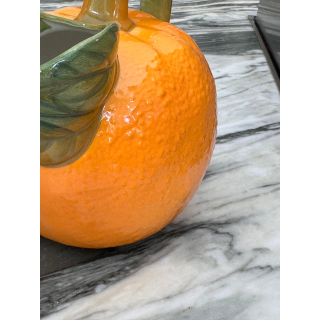 Bring some color of summer into your life with this vibrant citrus motif majolica style serving pitcher, reminiscent of...