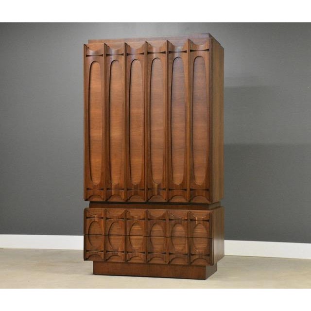 A mid century modern walnut tall chest on chest Tobago brutalist armoire dresser. Made in Canada. Professionally restored....