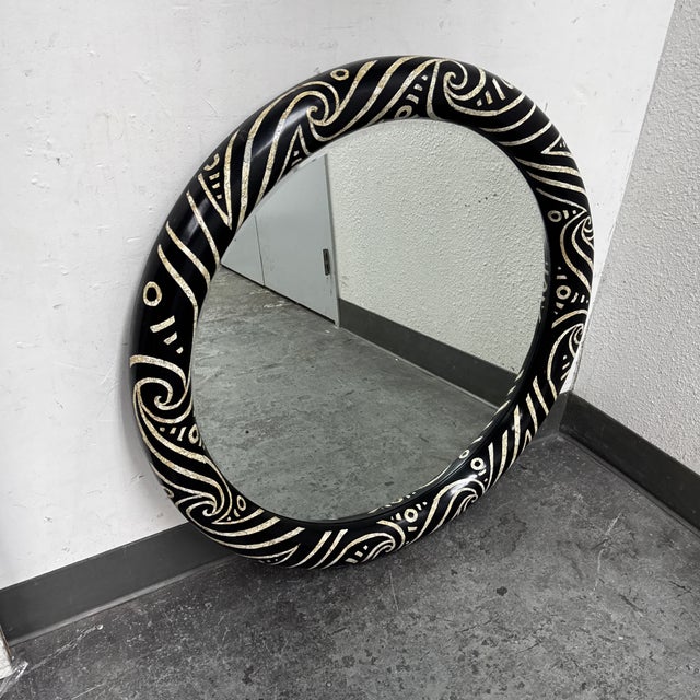 Design Plus Gallery presents a Monumental Round Mirror in the Style of Karl Springer. The circular mirror is framed by a...