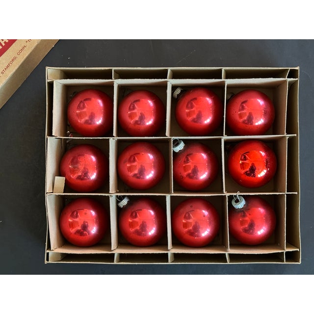 Hang these classic mid-century red glass ornaments on your Christmas tree for an authentic retro holiday decor touch. Made...