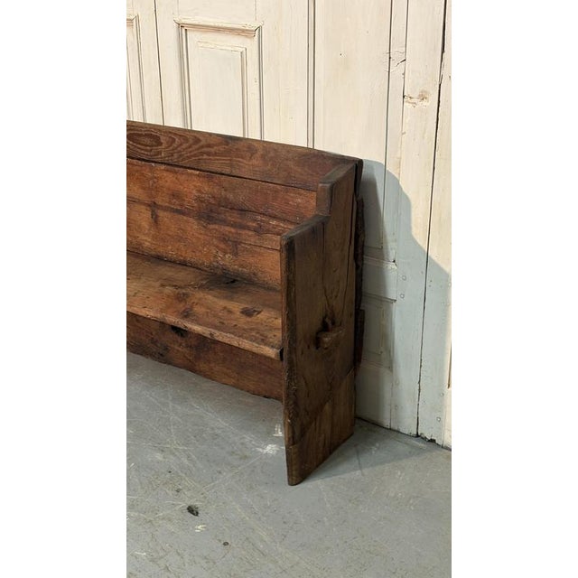 A very antique Brutalist bench made of chestnut wood, sourced from the mountains. Characterized by essential shapes, a...