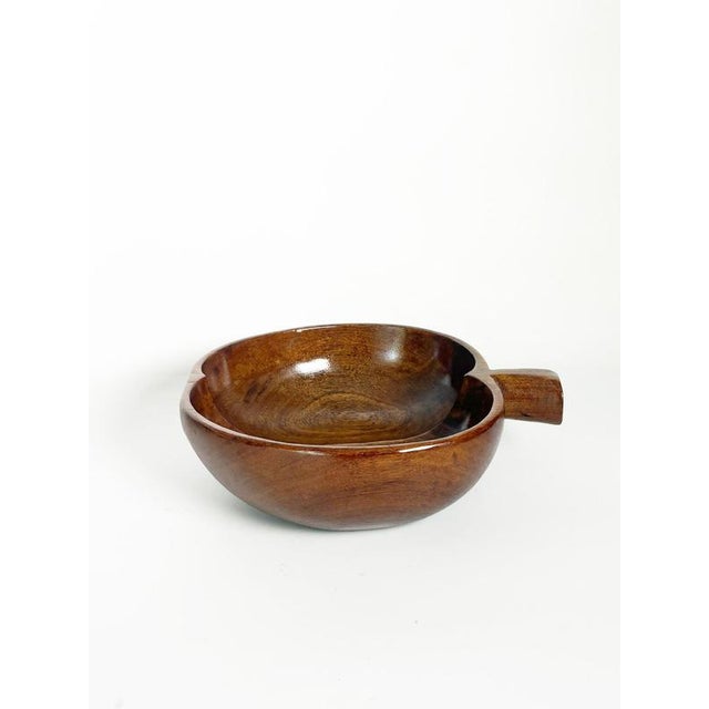 Charming French teak catchall tray dating from the 1960s. Carved in the shape of an apple, the piece features a deep,...