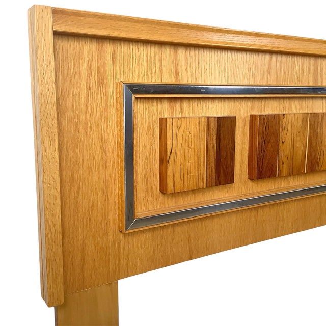 Evoke the bold, architectural optimism of late-century Canadian design with this striking queen-size headboard...