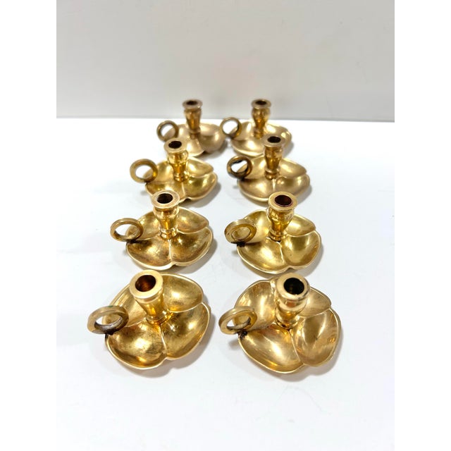 A tiny set of individual brass candle holders for each place setting at your table. A wonderful, very unique touch for a...