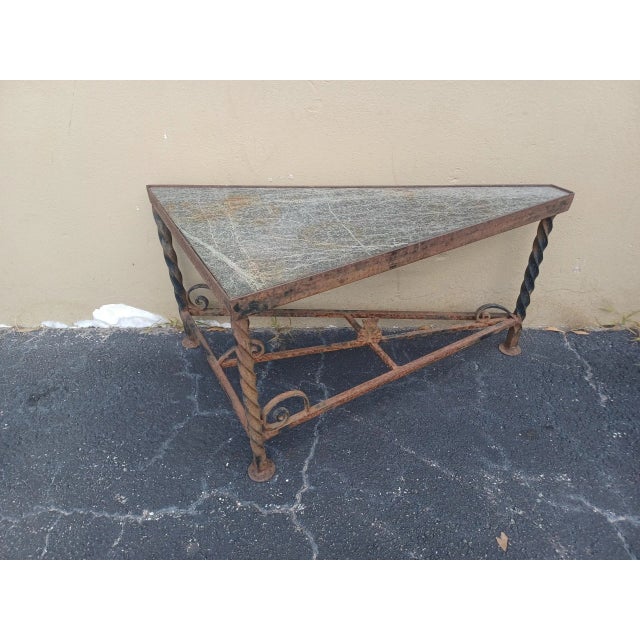 Vintage industrial twisted wrought iron and green granite triangular table. Very Heavy