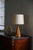 A sculptural danish table lamp crafted in solid beech wood, produced in denmark during the 1970s. The lamp features an...