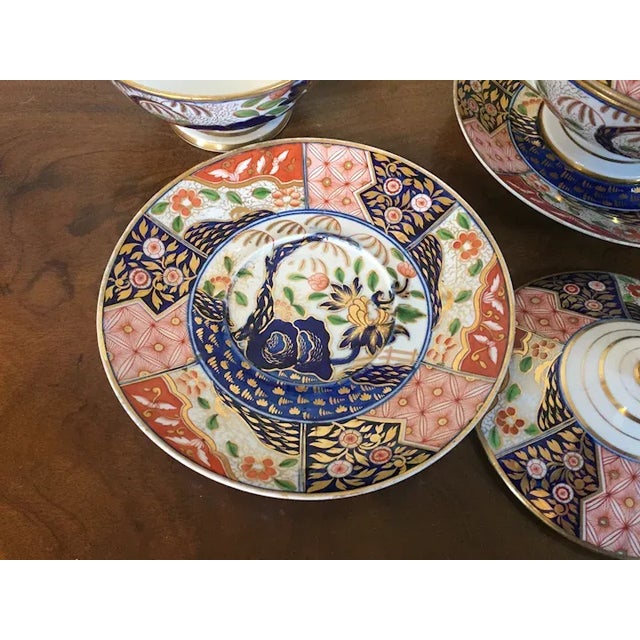 Fine pair early 19th century Worcester porcelain tureens and footed stands decorated in the imari rock & tree Coalport...