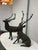 Design Plus Gallery presents a Pair of Majestic Antlered Resin Reindeer Sculptures. This decorative duo portrays two...