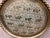 Impressive extra-large vintage brass tray featuring an intricately engraved procession of elephants surrounded by dense...