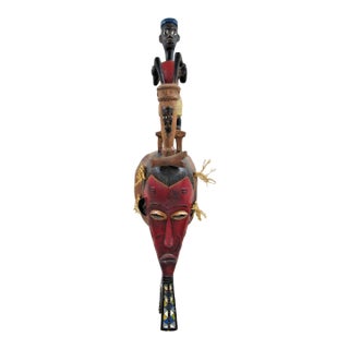 Antique Hand-Carved Guro Mask of the Ivory Coast Featuring a Seated Figure For Sale