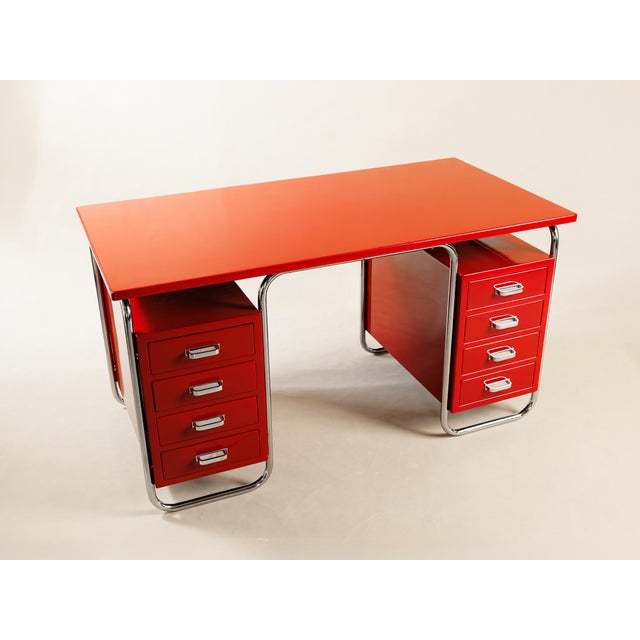 Funcionalism/Bauhaus The writing desk is professionally refurbished. The surface is finished with polyurethane varnish...