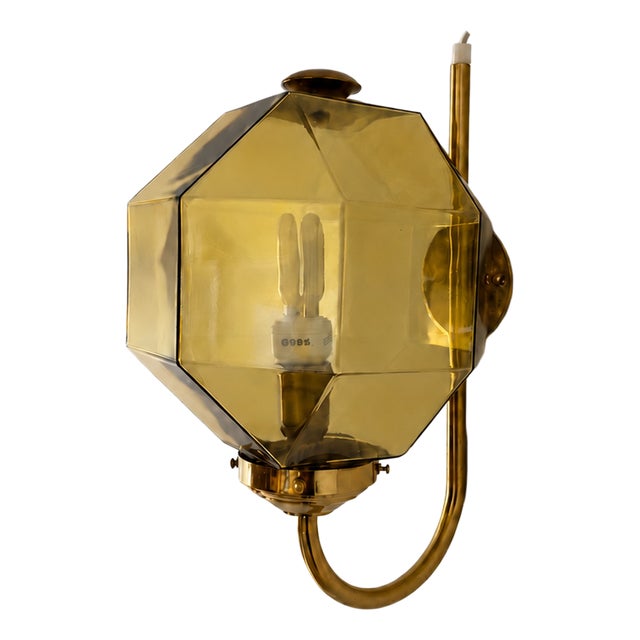 Swedish Modern Brass Wall Sconce with Faceted Amber Glass Shade from Bergboms, 1960 For Sale