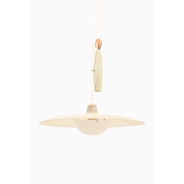 Rare height adjustable ceiling lamp by unknown designer. Produced by Bergbom in Sweden. Wear consistent with age and use....
