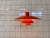 This red ph 4/3 pendant lamp, designed by poul henningsen for louis poulsen, is a timeless icon of danish lighting design....