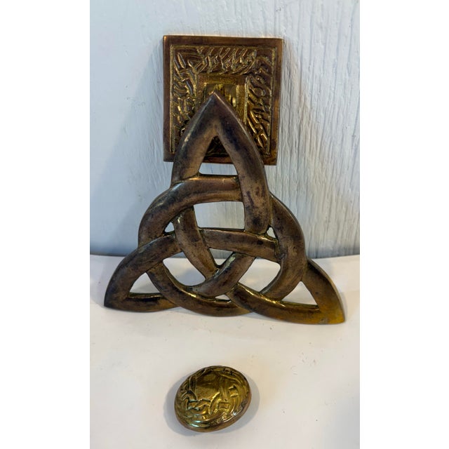 Nice vintage brass door knocker with Asian design.