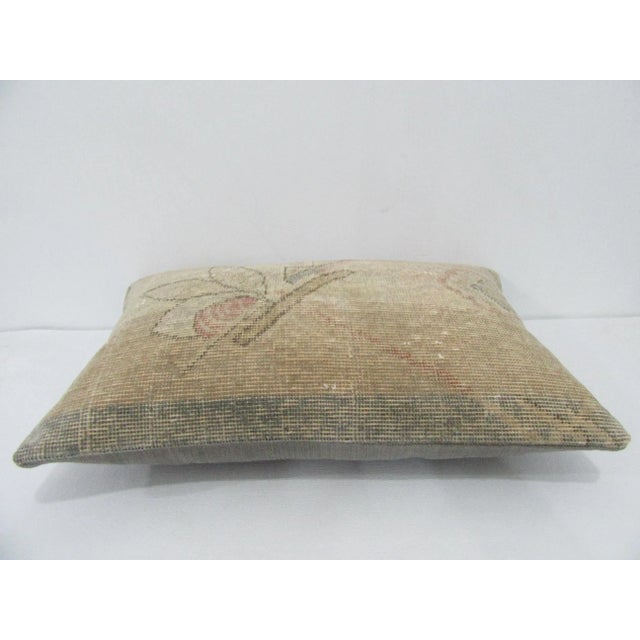 Decorative pillow cover made from a vintage Turkish handknotted rug. Backed with good quality cotton fabric. Pillow...