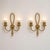 a refined pair of italian mid-century modern brass wall sconces, dating to the late 1940s and attributable to angelo lelii...